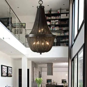 Classic black aluminum chain pendant lights dining room chandelier with intricate wrought iron design and warm-toned bulbs