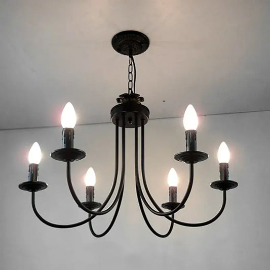 Classic black curved arm chandelier with five candle-style bulbs in wrought iron for dining room decorbites black curved design