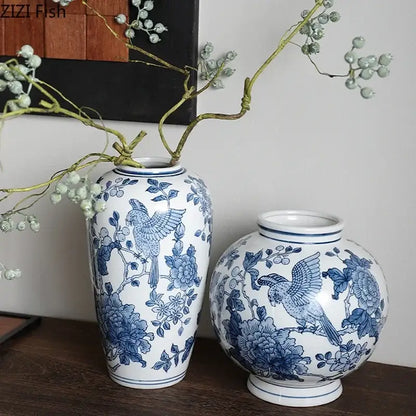 Two blue porcelain vases with bird and floral motifs in traditional chinese style for decorbites blue porcelain decor