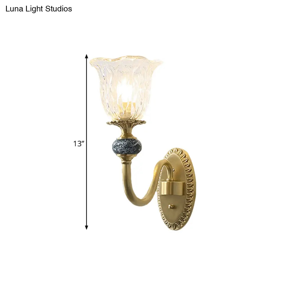 Classic Brass Floral Wall Sconce with Clear Ribbed Glass and Swooping Arm - 1/2-Head Wall Mount Lamp