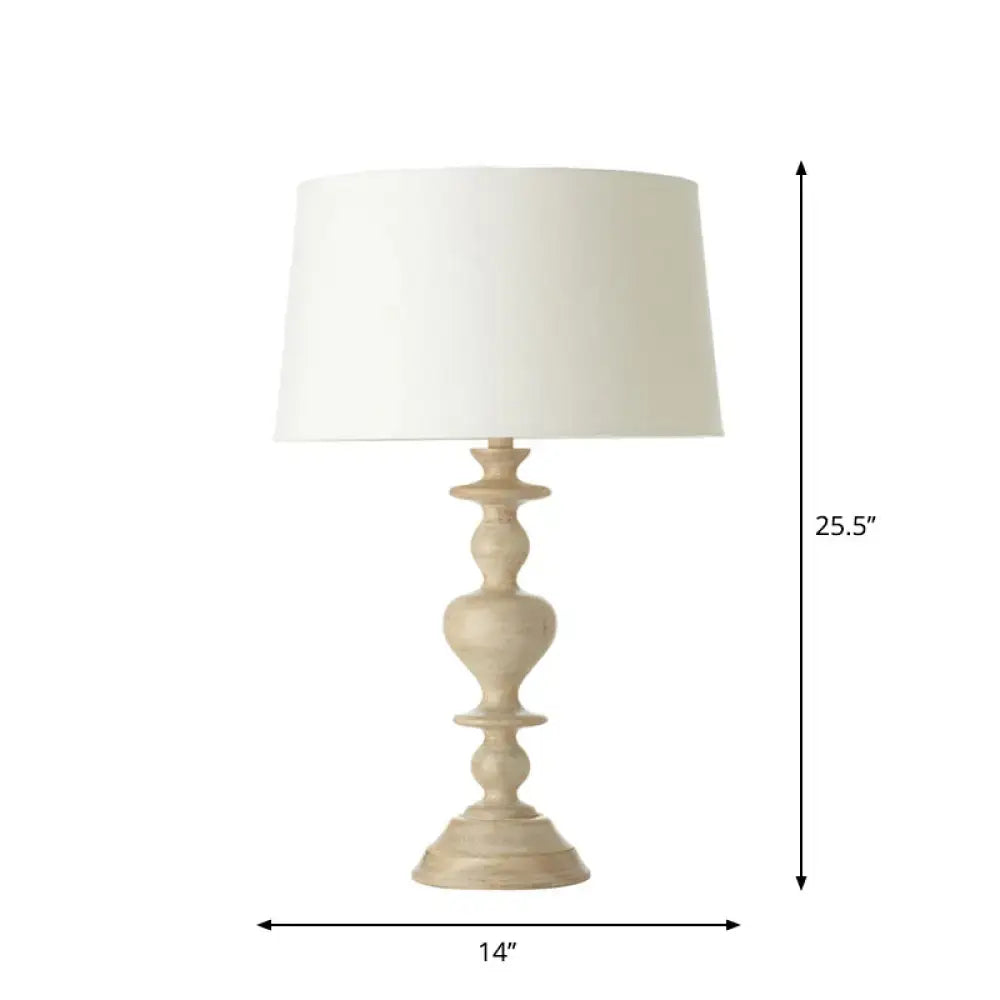 A cream-colored DecorBites™ nightstand lamp with white fabric shade and white resin base compatible with 220v-240v