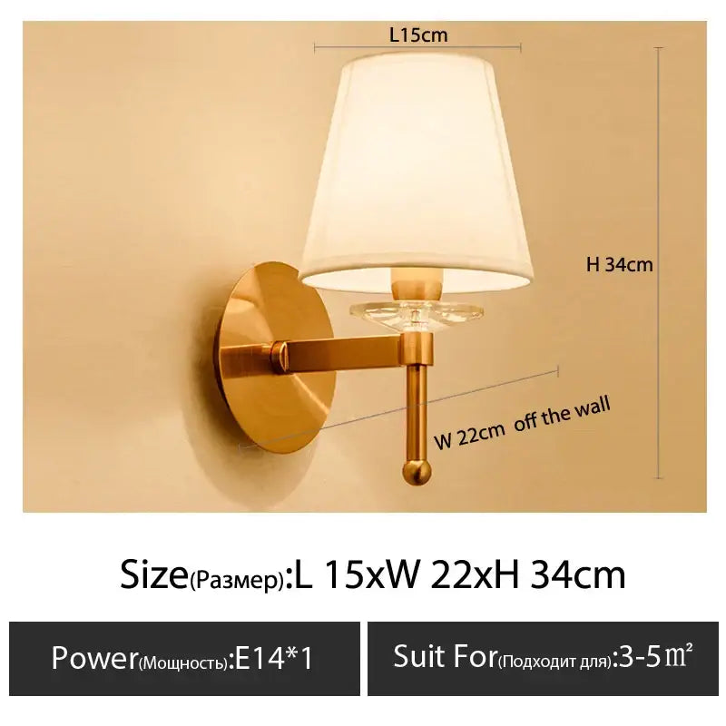 Brass-finished wall light with white fabric cloth cover and clear crystal accent for elegant bedroom decorbites cloth cover wall