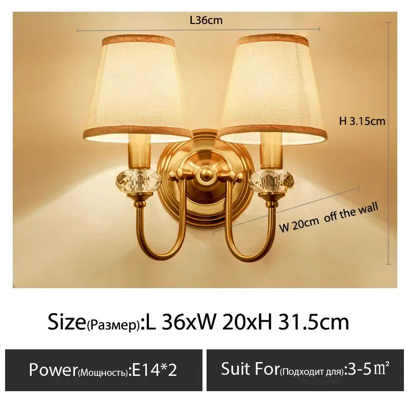 Gold-finished double-arm wall light with cream fabric cloth cover and crystal accents decorbites cloth cover wall sconce
