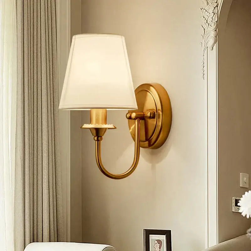 Gold-toned wall light with cream cloth cover shade classic gold cloth cover fabric sconce for bedroom decorbites cloth cover wall