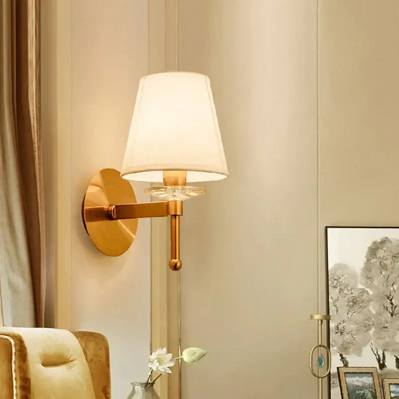 Classic gold cloth cover wall light with white fabric shade and clear crystal accents for elegant bedroom decorbites cloth cover wall