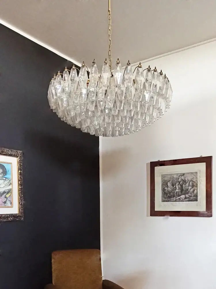 A classic large pink glass chandelier with amber crystal facets and gold metal frame for dining room lighting decorbites large pink