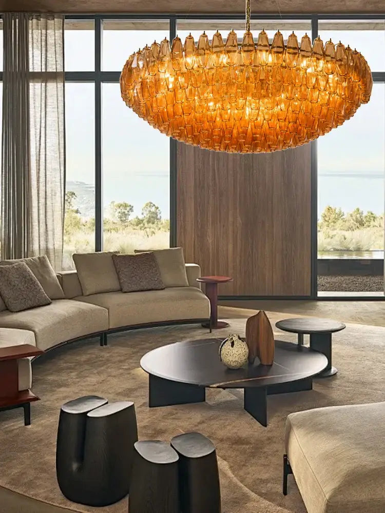 A large pink glass chandelier with amber honeycomb texture for classic dining room lighting by decorbites