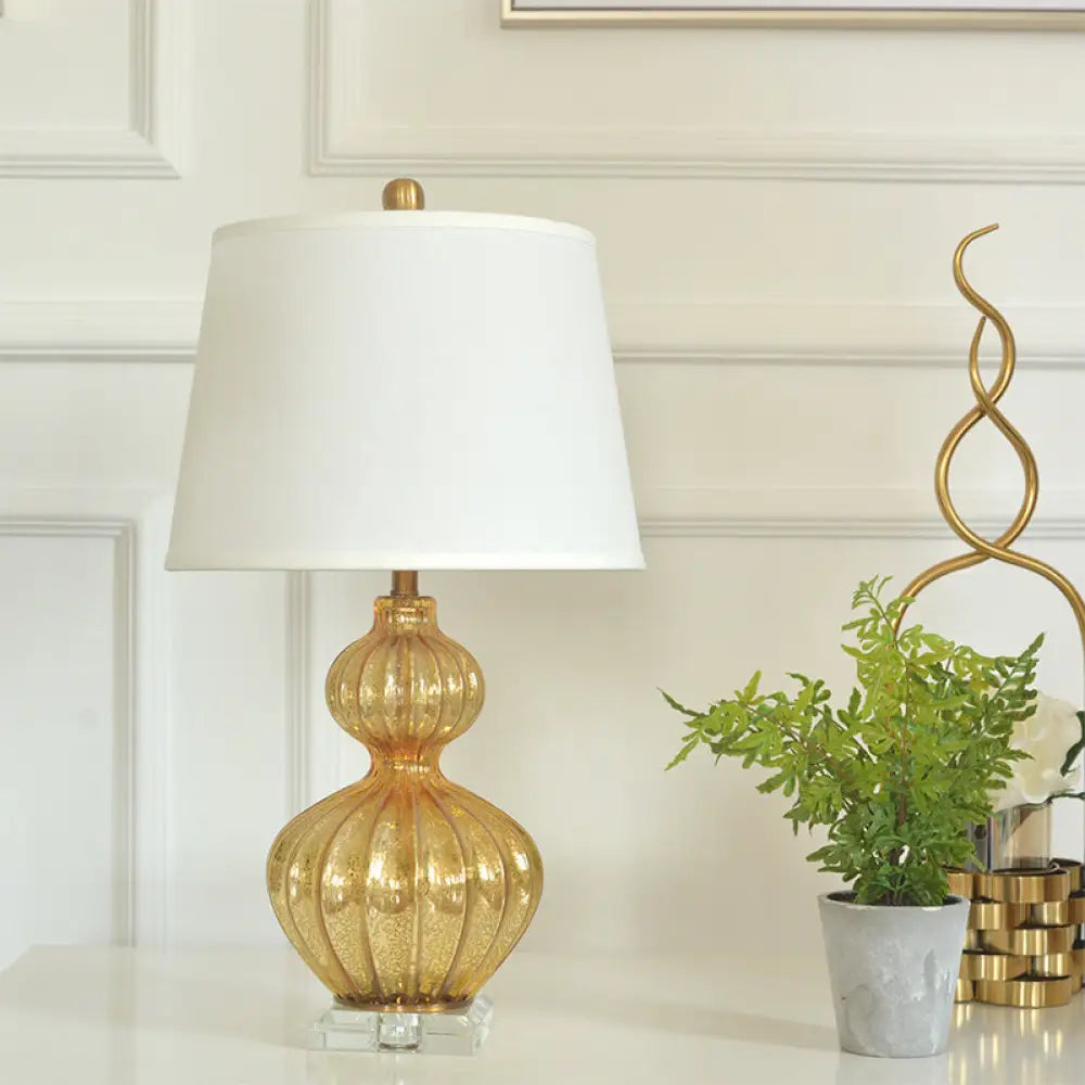 Classic White Tapered Drum Nightstand Lamp with Elegant Gold Gourd Base, 1 Light