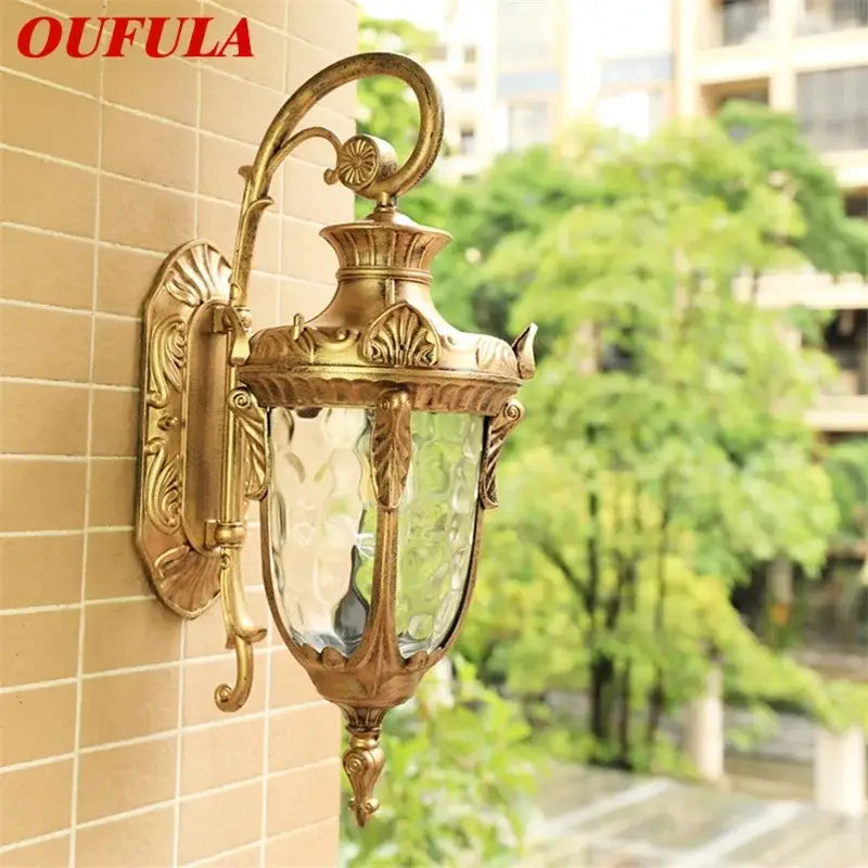 Classical bronze led outdoor wall lamp with brass-finished ornate design and textured glass panels for decorbites bronze led