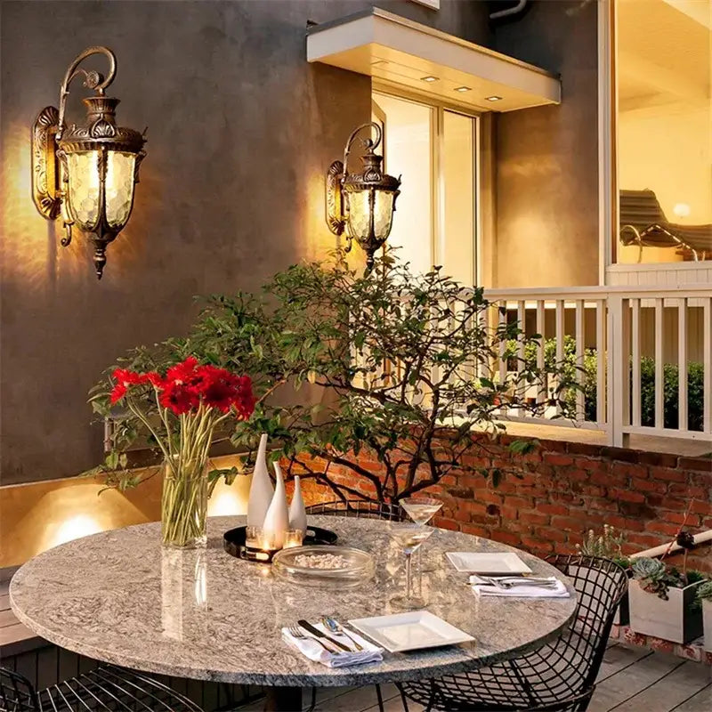 Antique brass wall lamp with ornate metalwork and frosted glass panels decorbites bronze led outdoor lighting