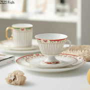 Classical gold-striped ceramic cup and saucer set featuring a white porcelain ceramic cup with gold rim and red floral patterns