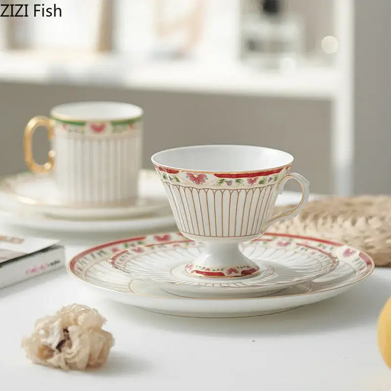 Classical gold-striped ceramic cup and saucer set featuring a white porcelain ceramic cup with gold rim and red floral patterns