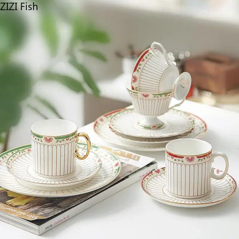 Classical gold-striped ceramic cup and saucer set with white porcelain and red floral accents for dining room use