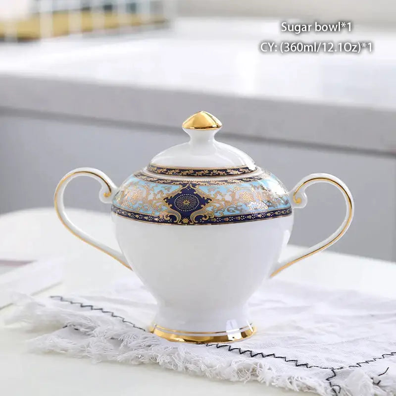 Classical gold trimmed bone china sugar bowl with blue and gold decorative band in white porcelain creamer set decorbites