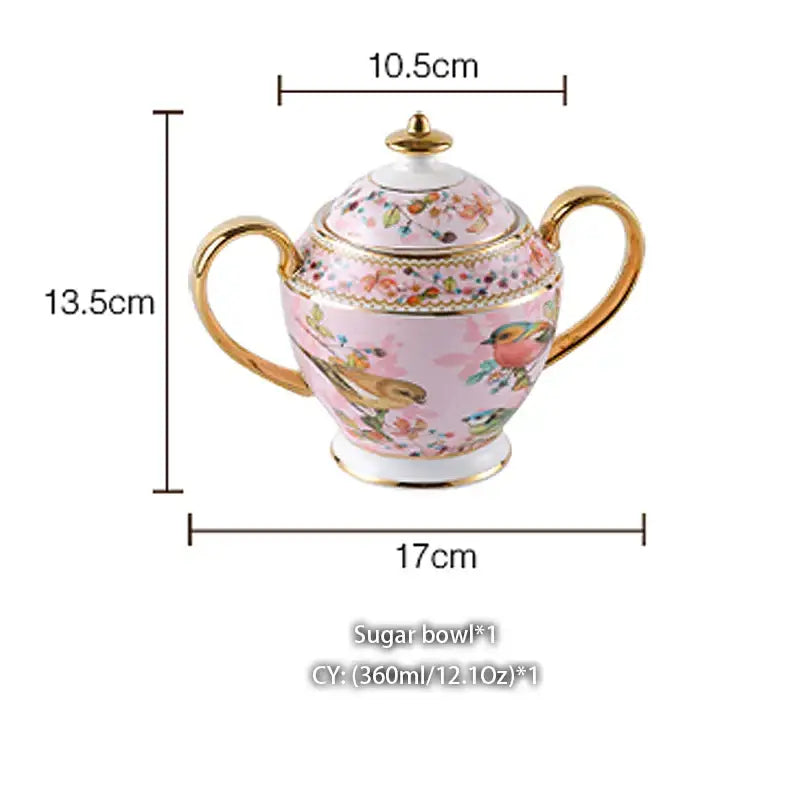 A delicate pink porcelain sugar bowl with gold accents and floral bird design in decorbites bone china creamer set