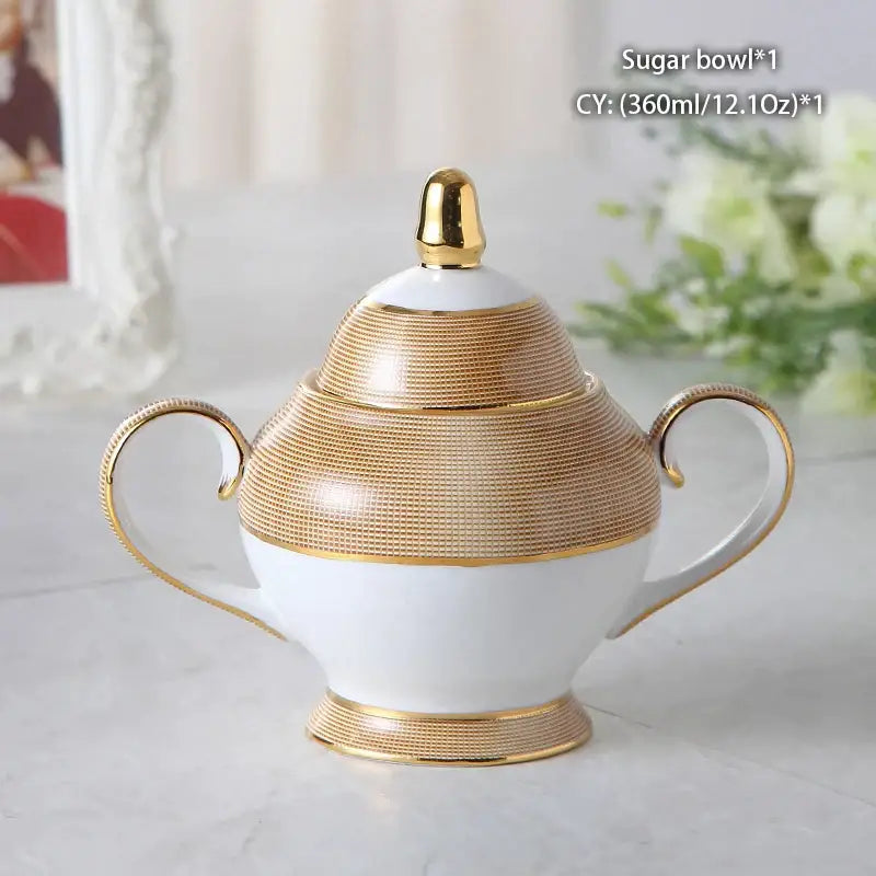 Elegant white ceramic sugar bowl with gold-toned mesh handles and lid from decorbites bone china creamer set