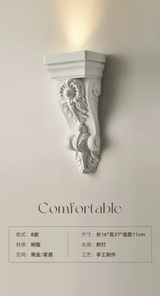 Classical ornate white cream resin wall lamp with floral and scrollwork decorbites cream resin corbel design