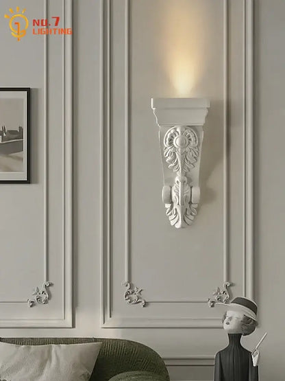 Classical ornate white cream resin wall lamp with intricate floral and scrollwork design for elegant living room decorbites cream resin wall