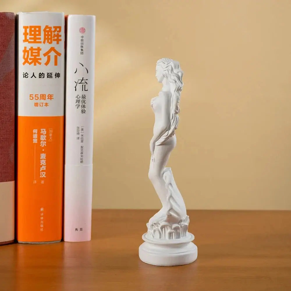 White resin 18cm aphrodite sculpture of greek goddess with flowing hair and draped garment for living room decor