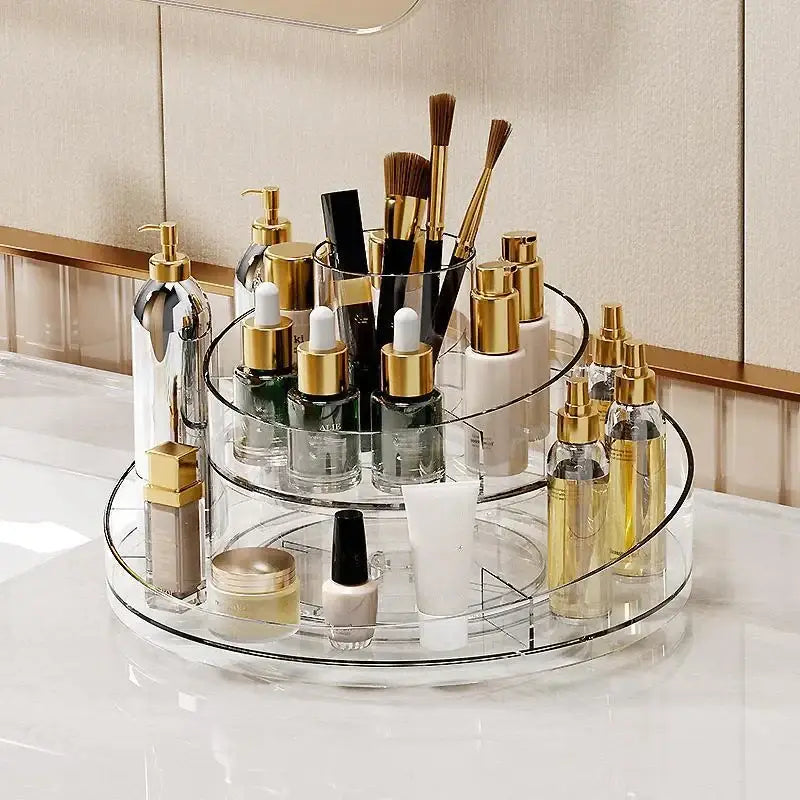 Clear two-tier rotating acrylic makeup organizer with gold-toned accents for bedroom vanity storage and acrylic makeup use