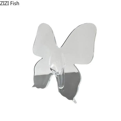 Clear acrylic butterfly vase featuring a transparent butterfly-shaped adhesive hook for decorbites butterfly vase display