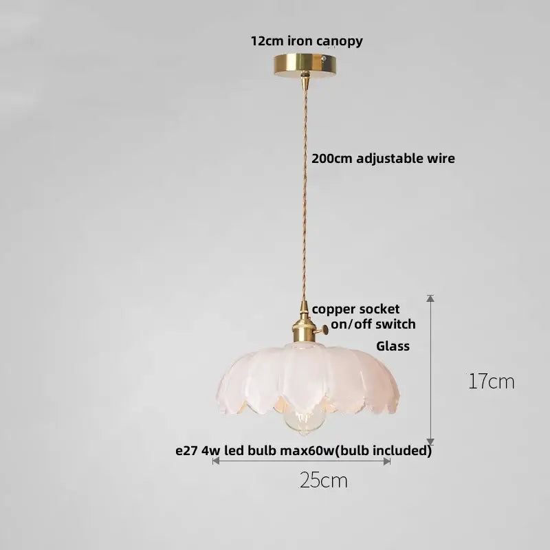 Delicate translucent pink pendant lamp with fluted petal design and brass hardware featuring decorbites amber glass walnut accents
