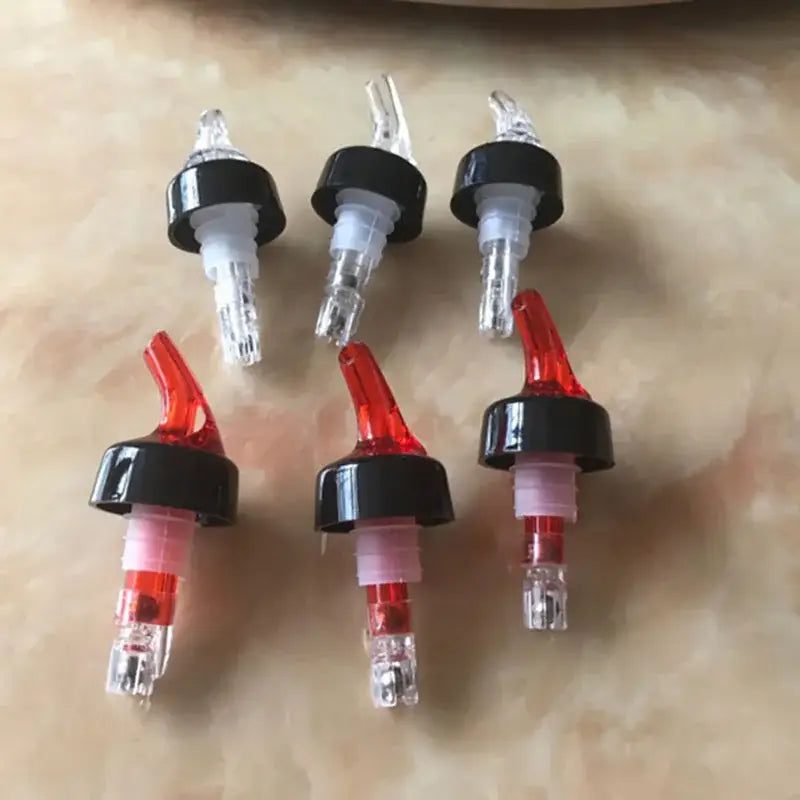 Clear and red plastic liquor pourer bottle dispensers with black caps for kitchen barware decorbites liquor pourer