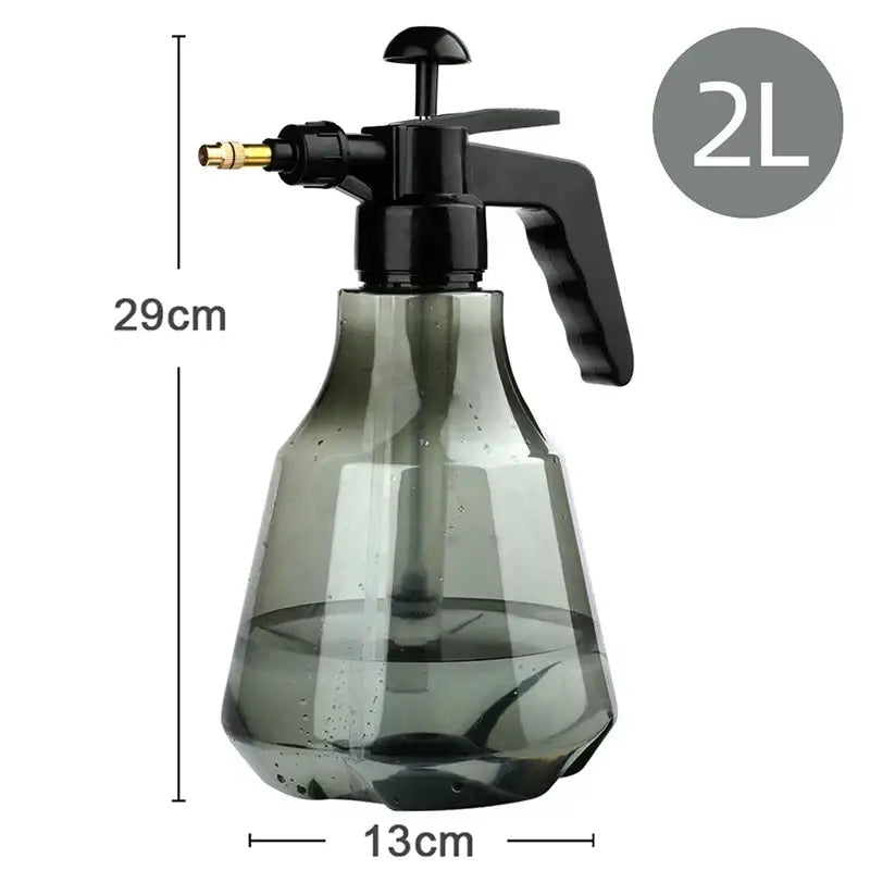 A 2-liter transparent gray plastic watering sprayer with black hand trigger and brass nozzle for flower care