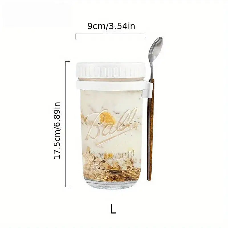 Clear borosilicate drinking glass jar with white lid and wooden spoon clip filled with oatmeal from drinking glasses set