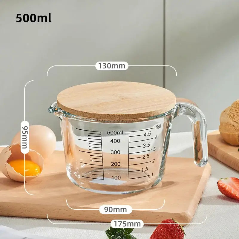 Clear borosilicate glass measuring cup with natural wood lid and handle marked for 500ml by decorbites borosilicate glass