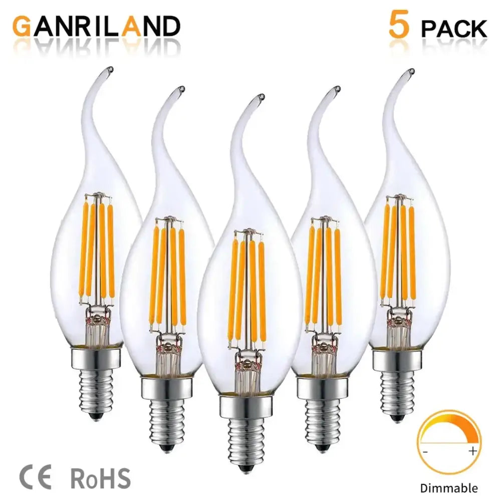 Clear dimmable c35 4w candle bulbs with warm yellow filaments and silver metal bases for dining room use