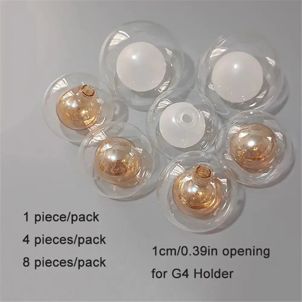 Clear glass shade replacement globes with gold filaments and white bases for g4 holders chandelier dining room use