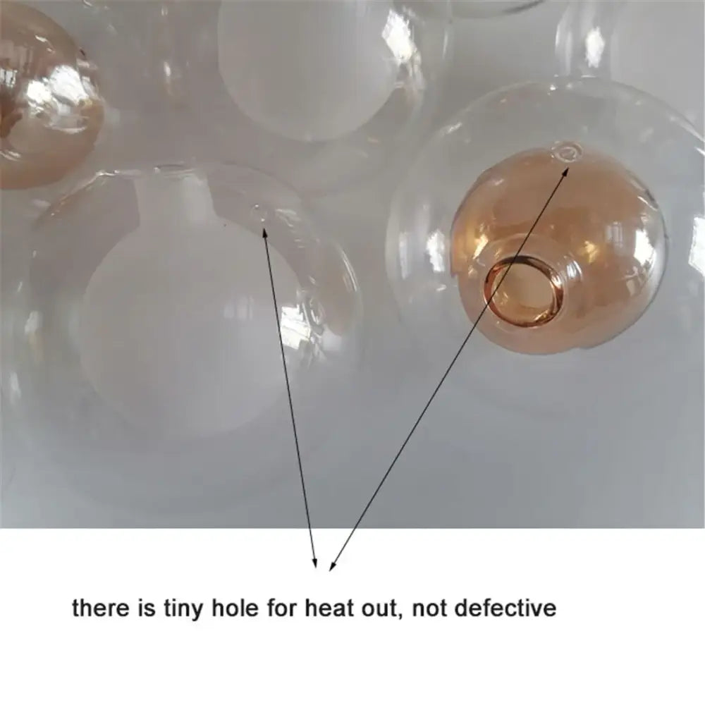 Clear g4 glass shade replacement globe with warm amber interior and top vent hole for chandelier dining room use