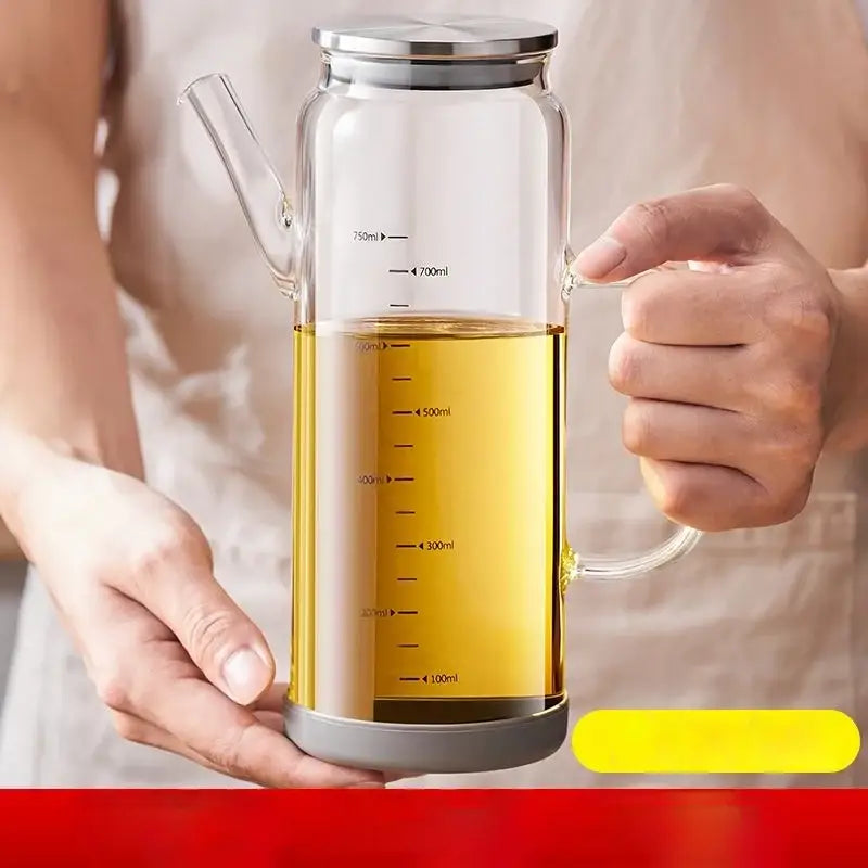 Clear glass condiment bottle set with silver stainless steel lids, gray bases, and milliliter measurement markings