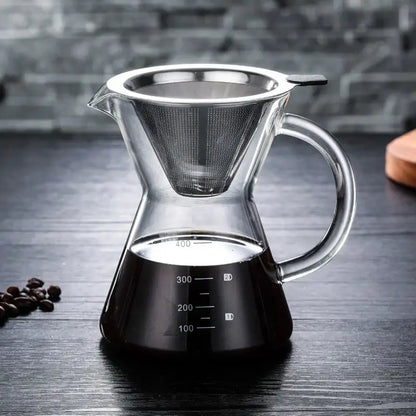 Clear glass coffee pot with stainless steel filter and measurement markings for precise brewing in the kitchen dripper