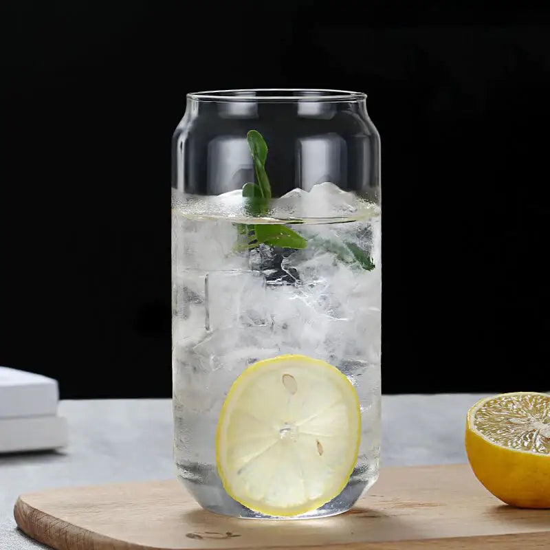 Clear glass drink cup can-shaped tumbler with ice mint lemon and bamboo lid and straw by decorbites glass drink