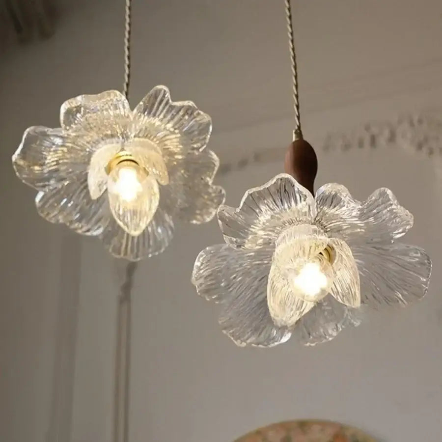 Clear glass flower acrylic led pendant light with textured petals and warm bulbs for dining room decorbites acrylic led