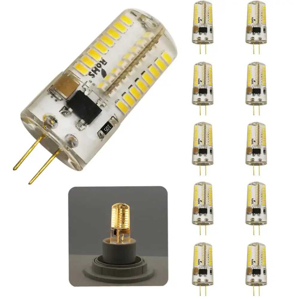 Clear glass led chandelier bulb with multiple yellow diodes and gold metal pins for dining room spotlight use