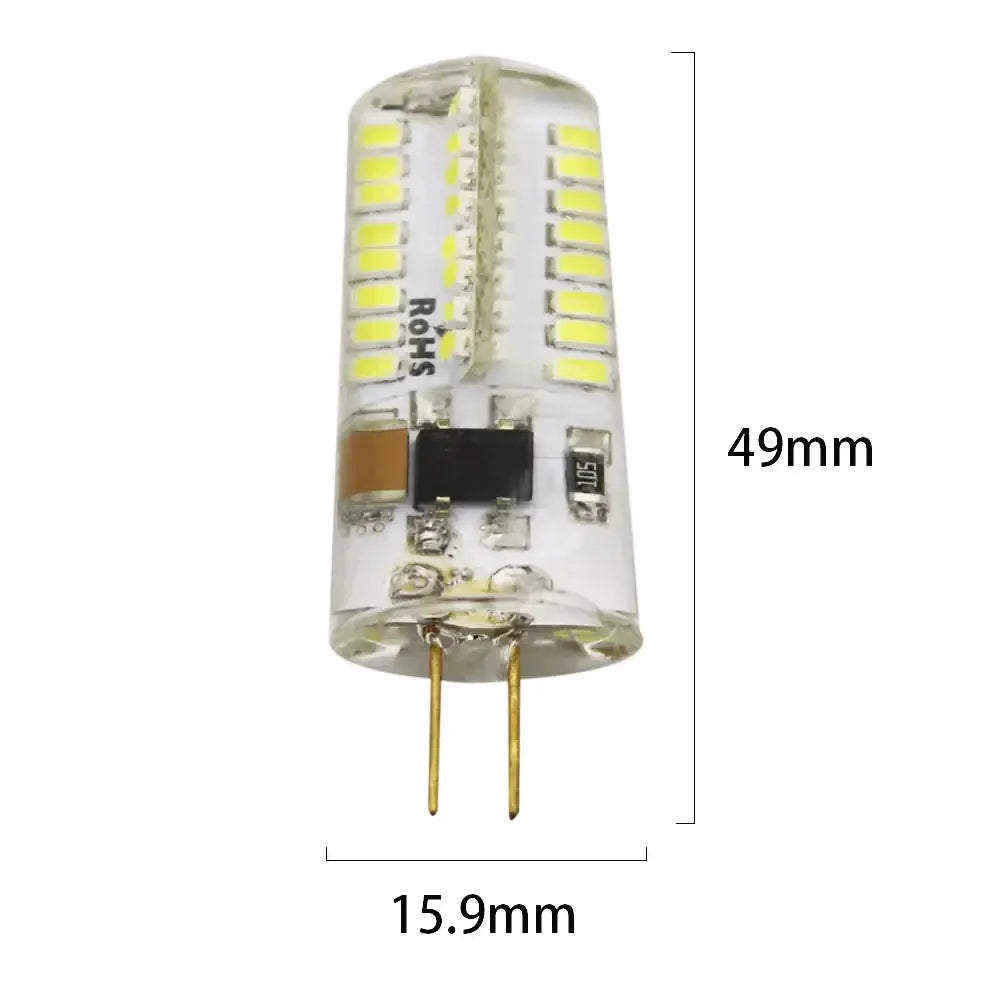 Clear glass led chandelier bulb with yellow leds rows, black circuit board, and gold pins for dining room spotlight
