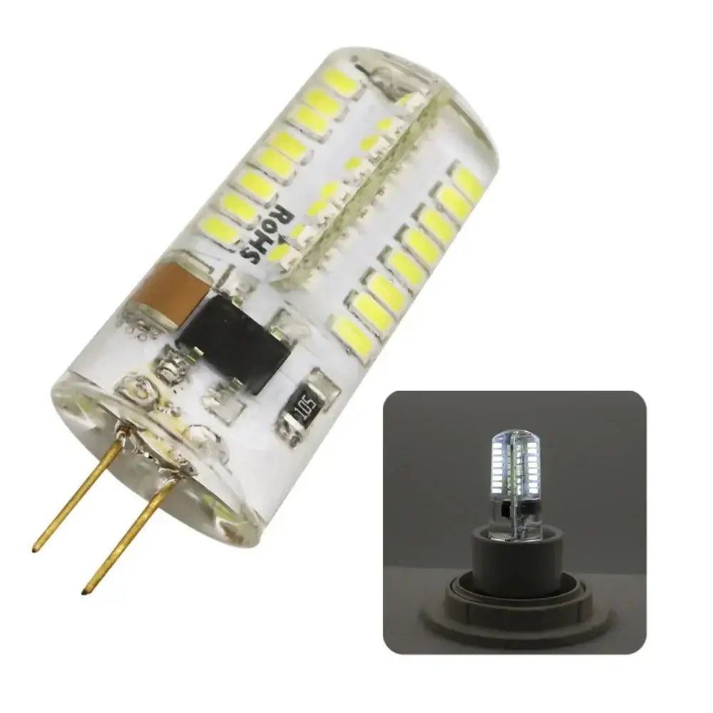 Clear glass led chandelier bulb with multiple yellowish leds and gold-colored pins for dining room spotlight use