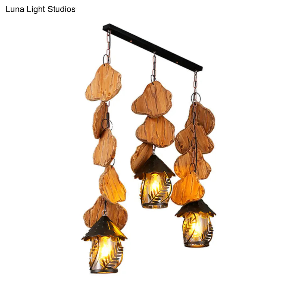 Clear Glass Nautical Lantern Chandelier with Wood Leaf Pattern Pendant Light