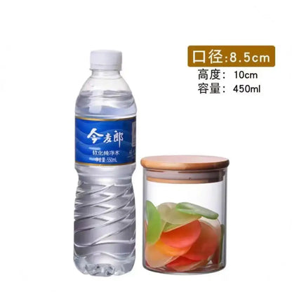 Clear glass storage jar with bamboo lid containing colorful fruit slices for kitchen organization and storage jars