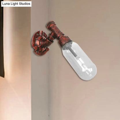 Clear Glass Wall Sconce in Weathered Copper with Pipe Design - Perfect for Loft Dining Rooms