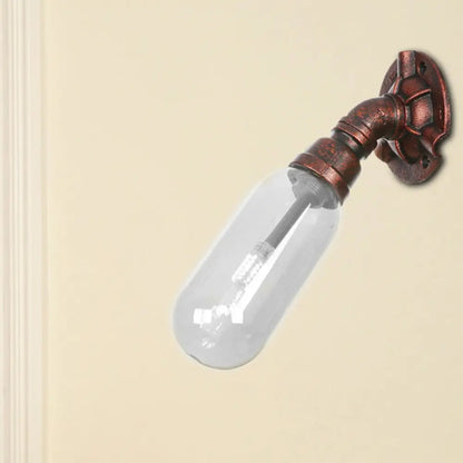 Clear Glass Wall Sconce in Weathered Copper with Pipe Design - Perfect for Loft Dining Rooms