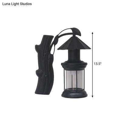 Clear Glass Wall Sconce with Retro Coastal Design and Black/Copper Finish