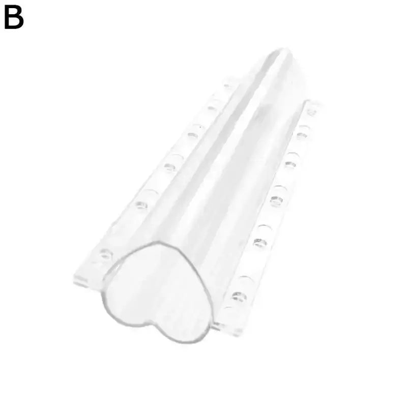 Clear plastic heart shaped vegetable growth mold with central channel and side holes for cucumber growth tool
