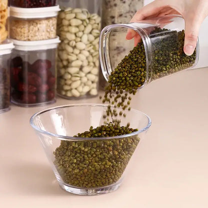 Clear glass rectangular hermetic kitchen organizer with rounded edges filled with green mung beans from decorbites hermetic kitchen