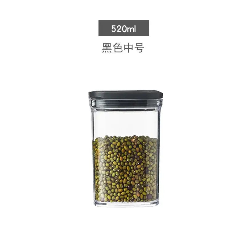 Clear glass hermetic kitchen organizer with black lid holding green mung beans by decorbites hermetic kitchen