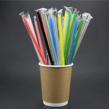 A cup filled with decorbites clear individually wrapped multicolor plastic drinking straws for kitchen use 100pcs