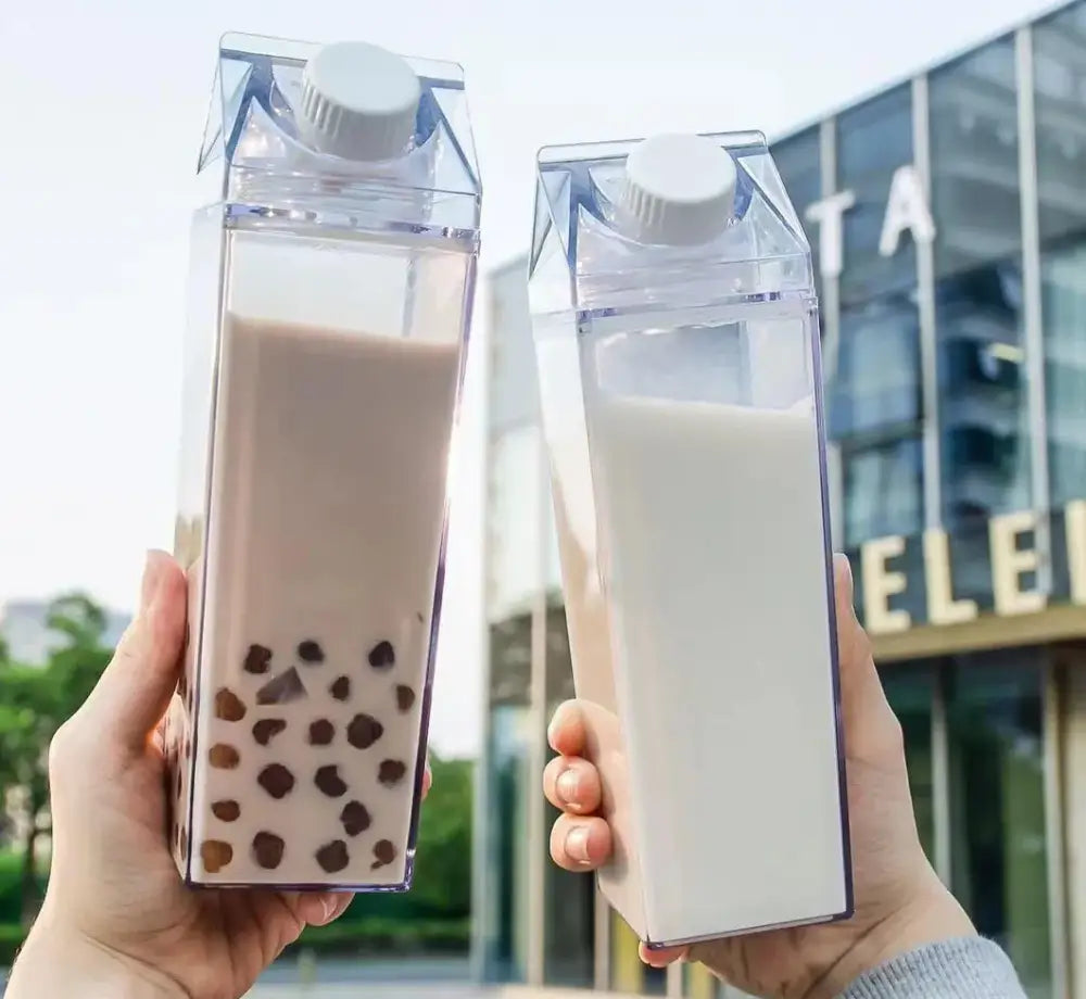 Two clear milk carton water bottles with white screw caps for kitchen juice storage by decorbites clear milk set